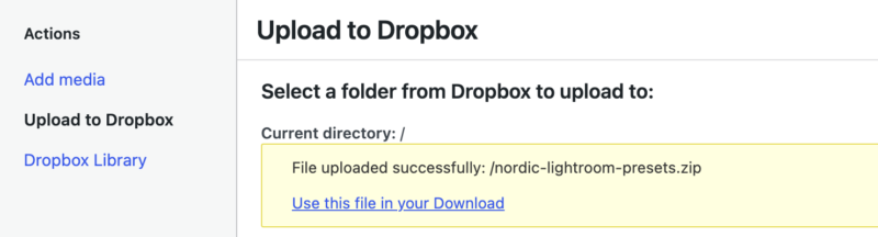 dropbox-file-store-upload-success – Easy Digital Downloads 左側のナビゲーション(アクション、メディアを追加、Dropboxにアップロード、Dropboxライブラリ)とメインエリアが表示されているDropboxアップロードパネル。「Dropboxにアップロード」タイトルが表示されています。成功アラートには「ファイルを正常にアップロードしました:/nordic-lightroom-presets.zip」と表示され、「このファイルをダウンロードで使用」リンクがあります。