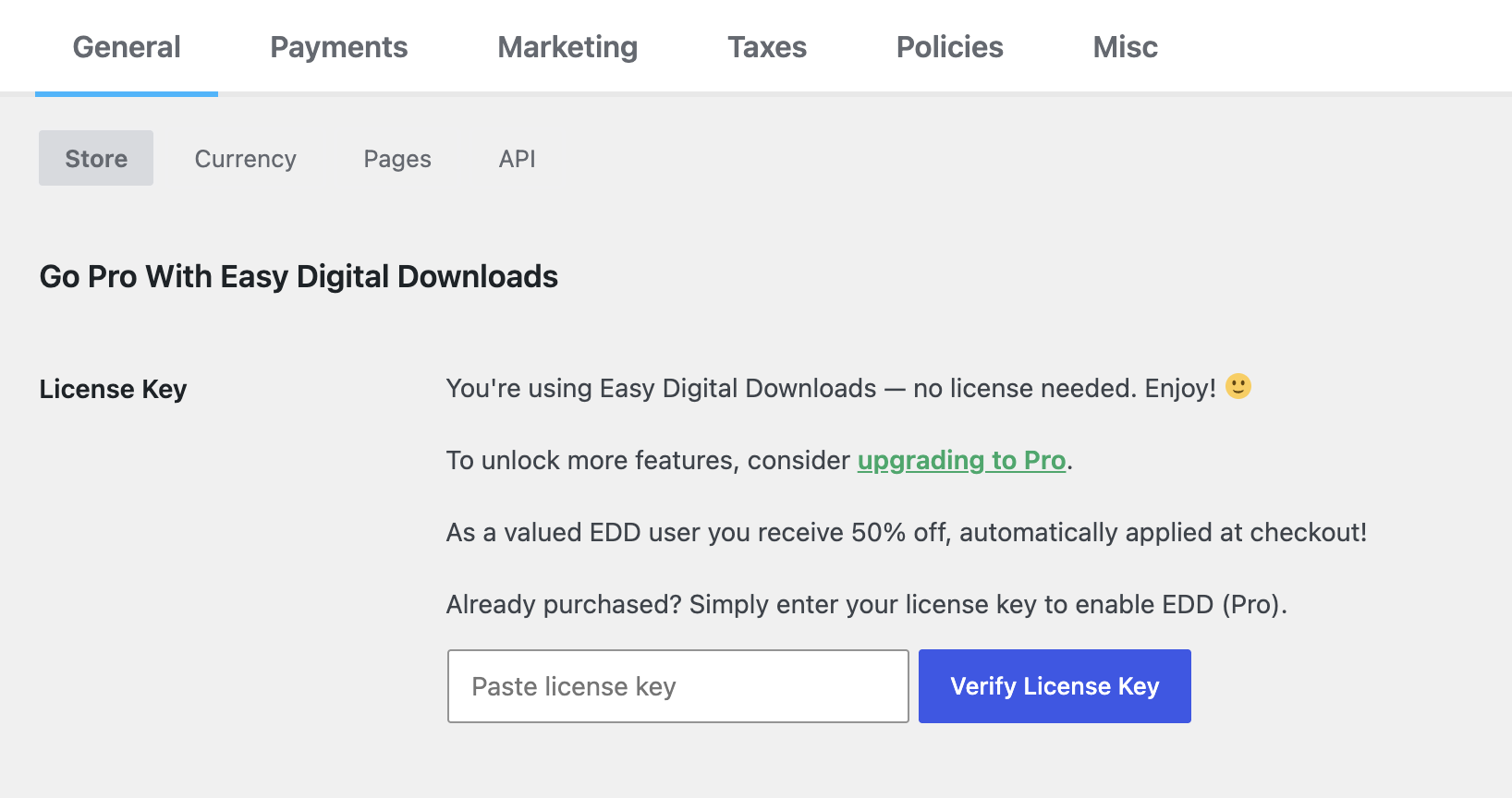 Schermata delle impostazioni di Easy Digital Downloads per incollare e verificare la chiave di licenza Pro.